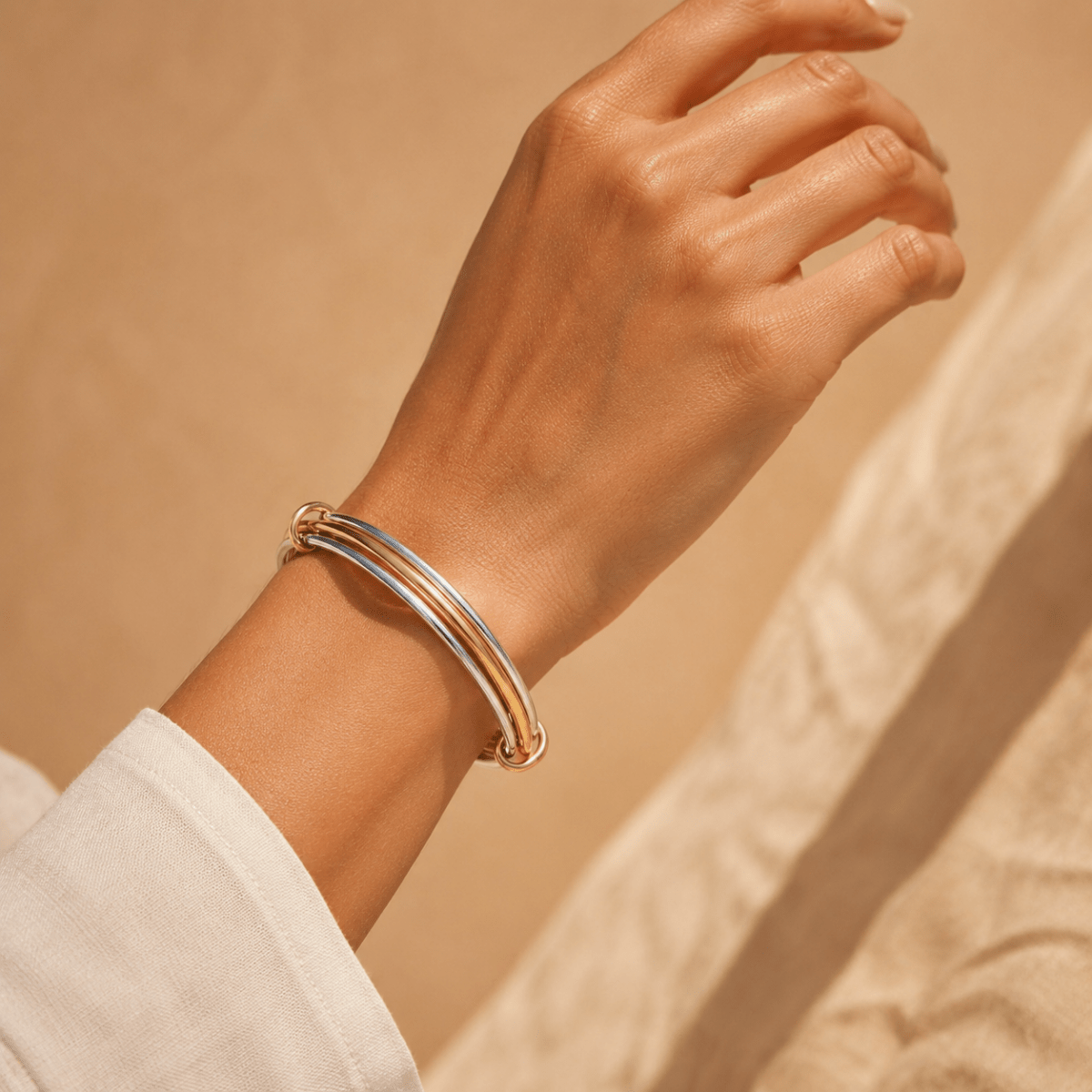 Cassia Triple-Orbit Two-Tone Bangle