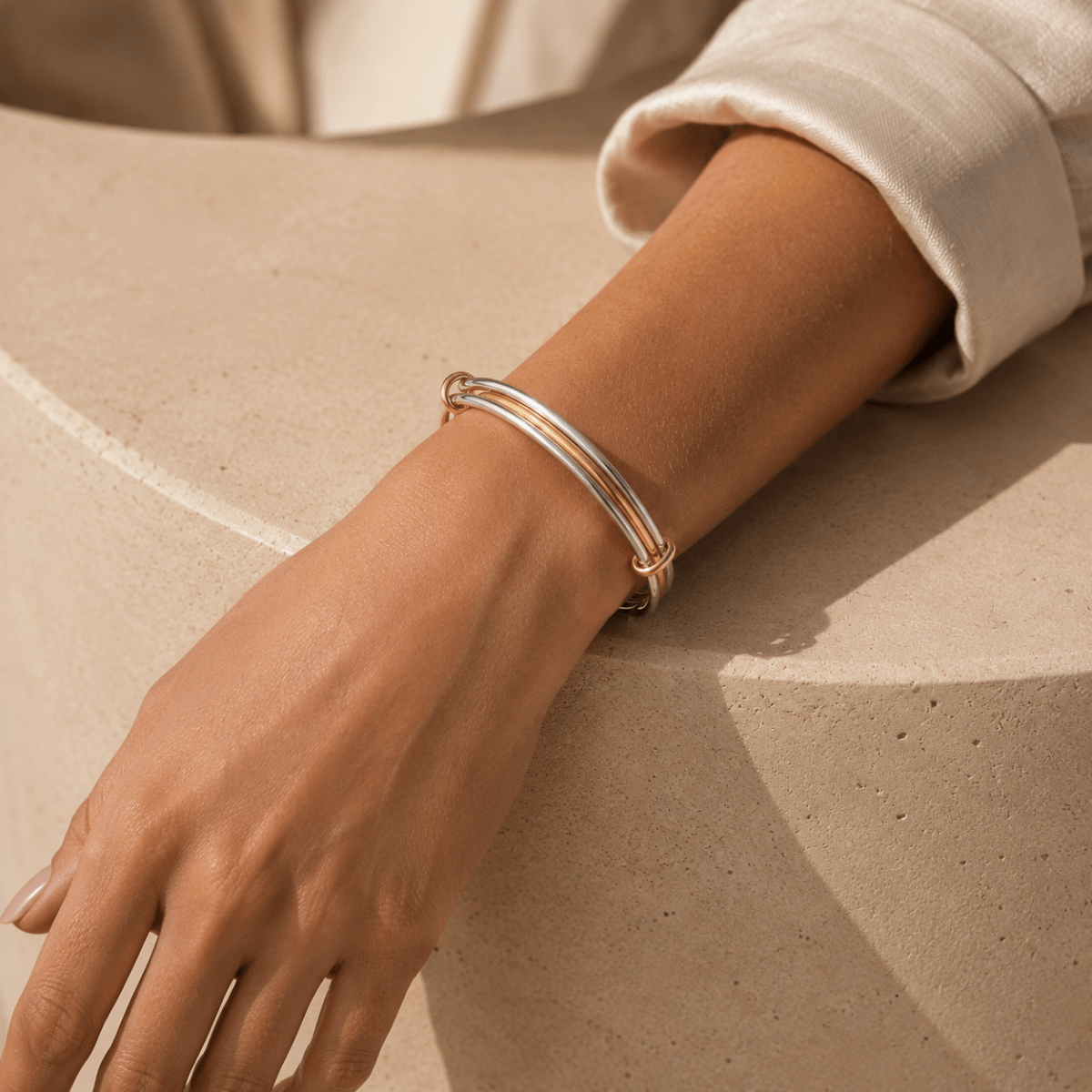 Cassia Triple-Orbit Two-Tone Bangle